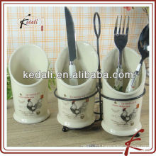 white ceramic kitchen tool holder with metal stand